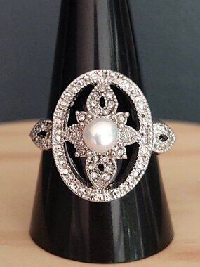 Silver tone ring with textured silver, faux pearl and cz's